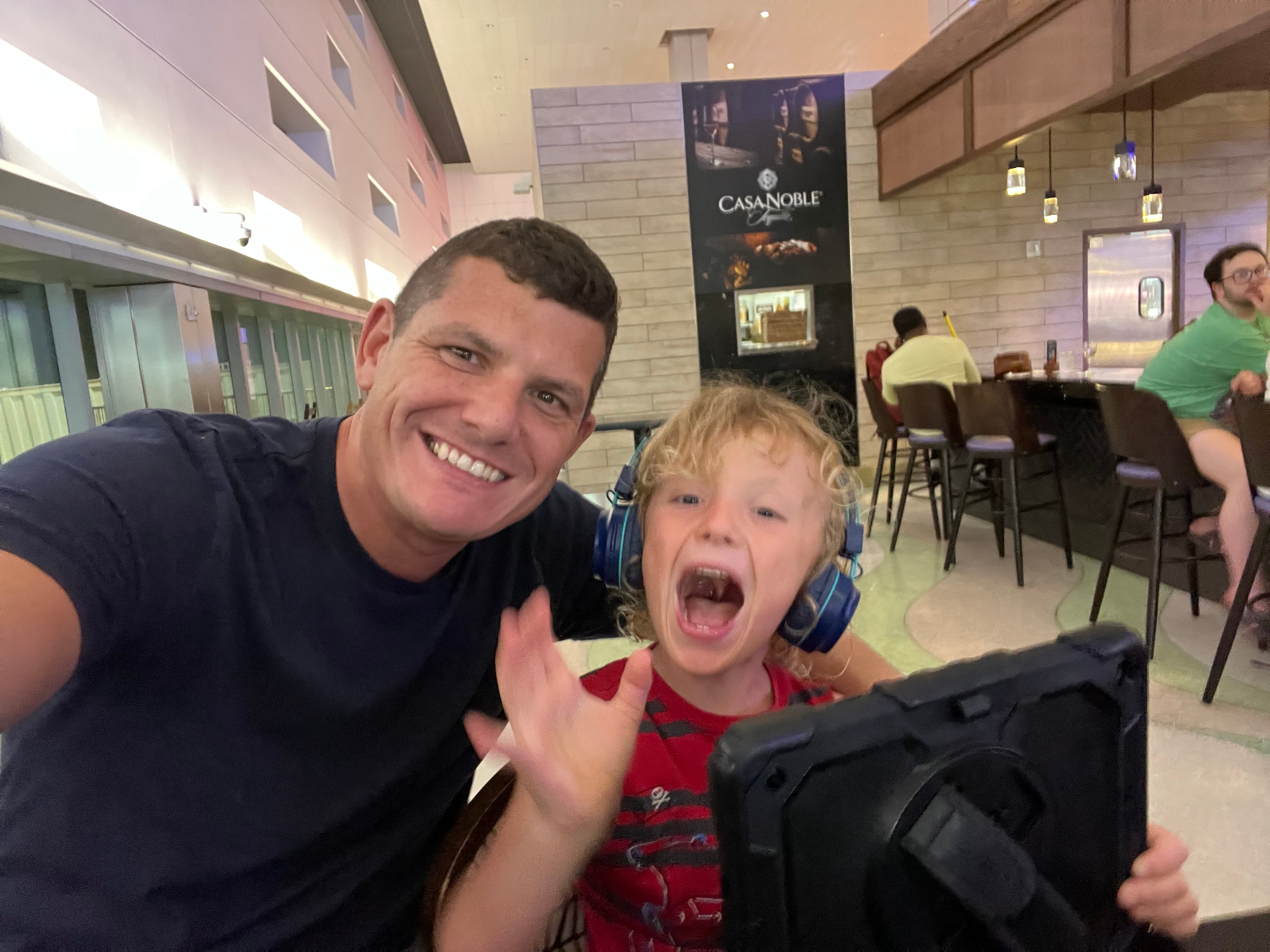 Dad and Logan sharing a selfie during an outing